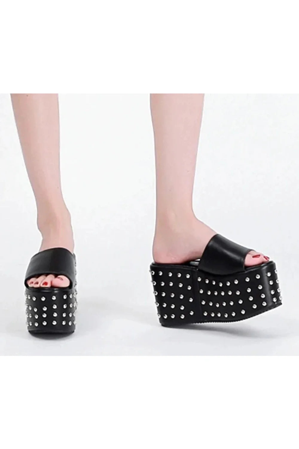 Black Rivet Walking Platform Sandals with rivet detailing.