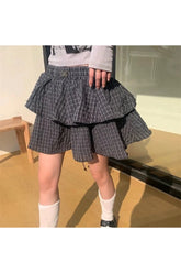 Black Ruffle Plaid Mini Skirt with flair.