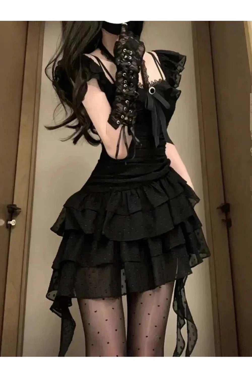 Black Ruffled Dark Fairy Mini Dress exudes elegance.