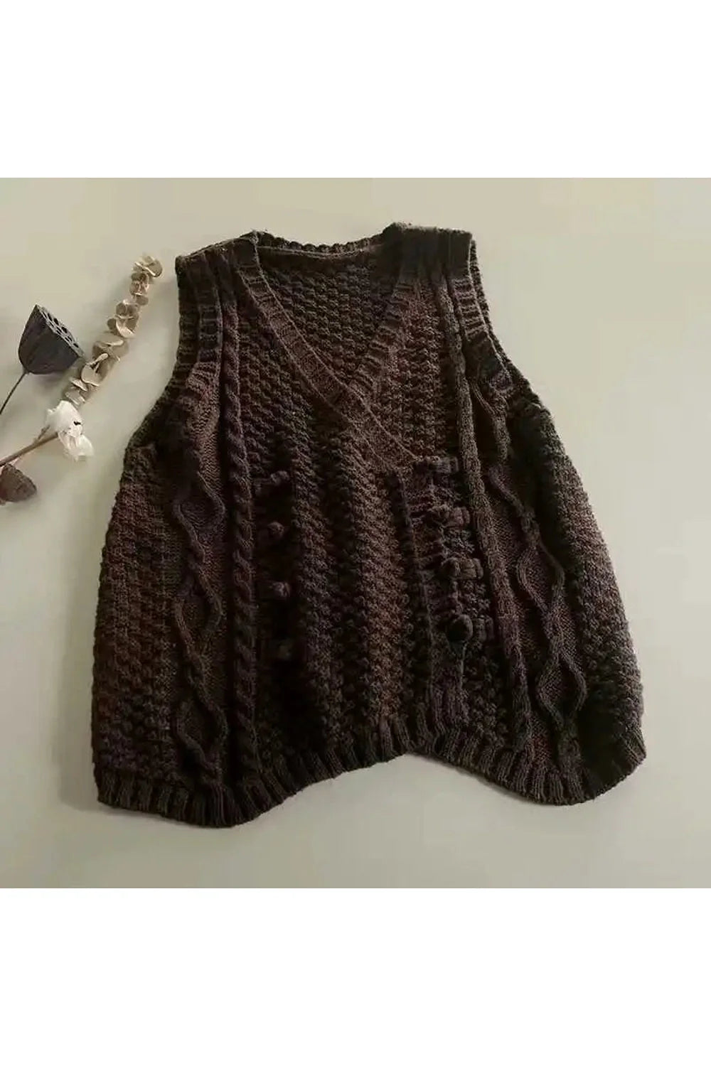 Cozy brown cable knit button vest.