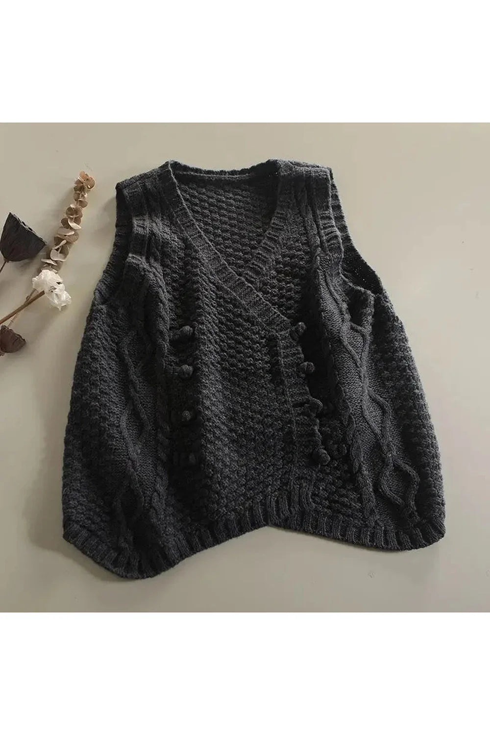 Cozy gray rustic cable knit button vest.