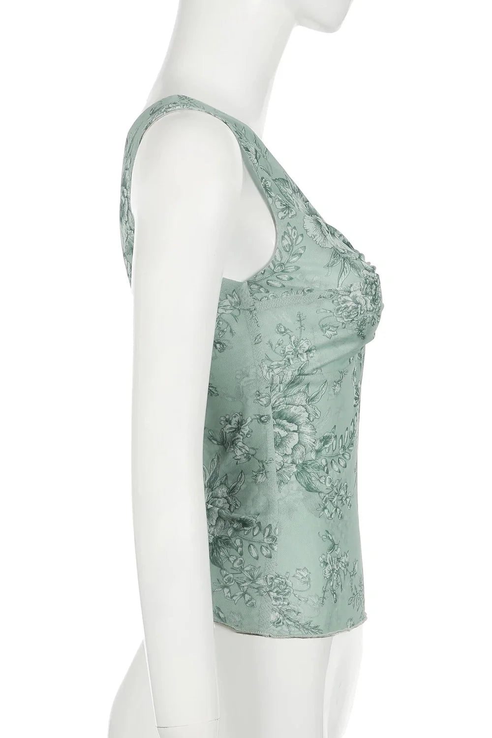 Floral sage green top exudes natural charm.