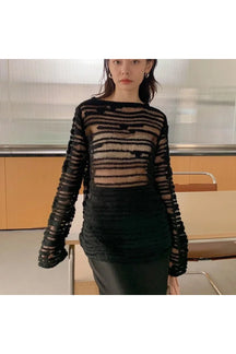 Sheer Shadow Striped Knit Top in black.