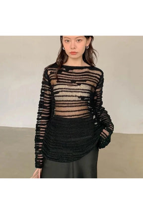 Sheer Shadow Striped Knit Top in black.