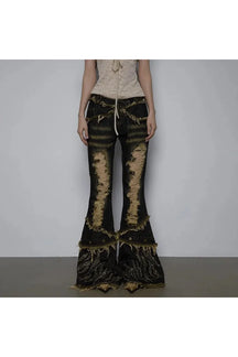 Edgy Black Shredded Flames Distressed Flare Pants.