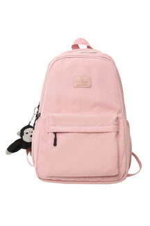 Pink Solid Color Nylon Backpack, ideal for travel.