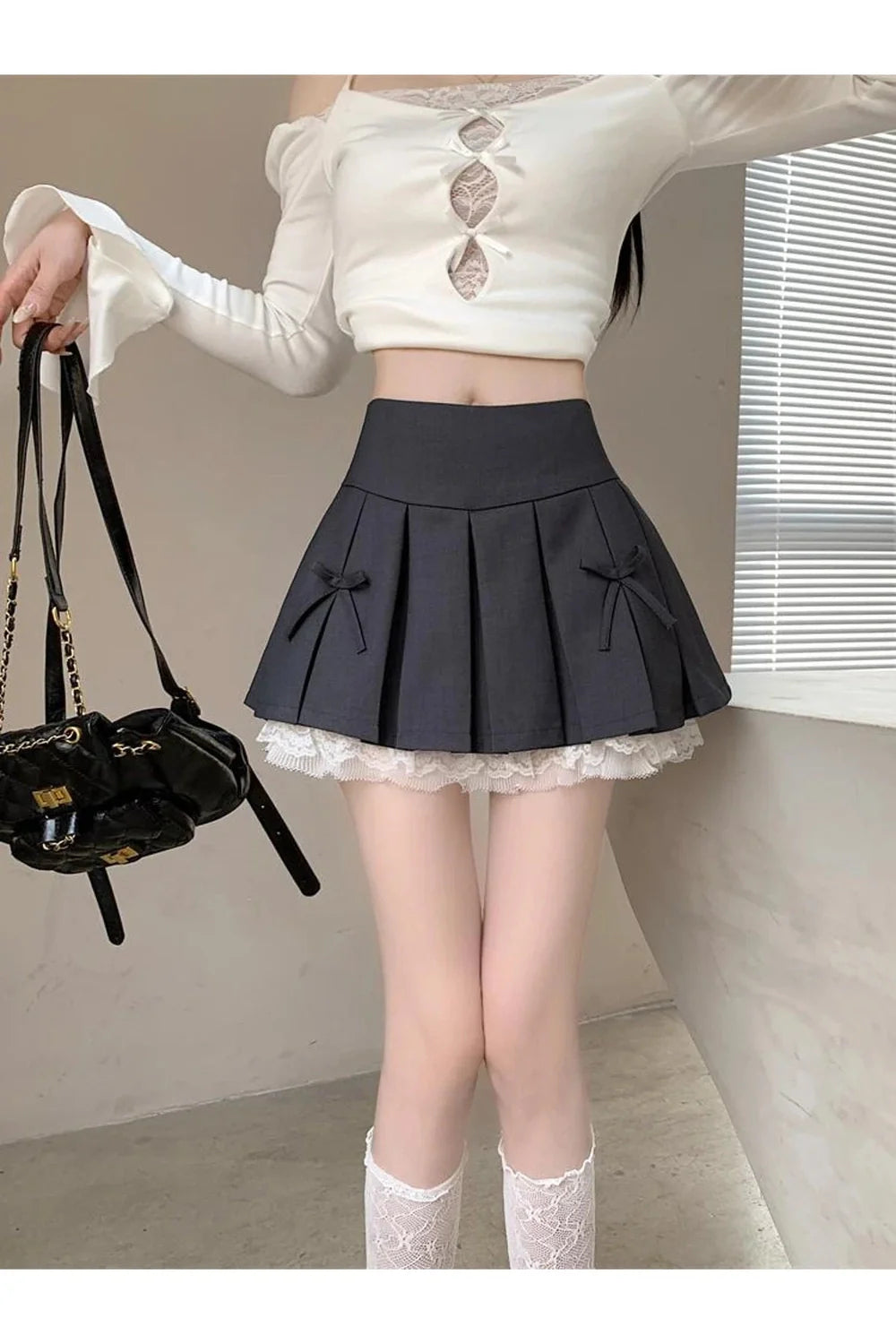 Black Spliced Lace Mini Skirt with elegance.