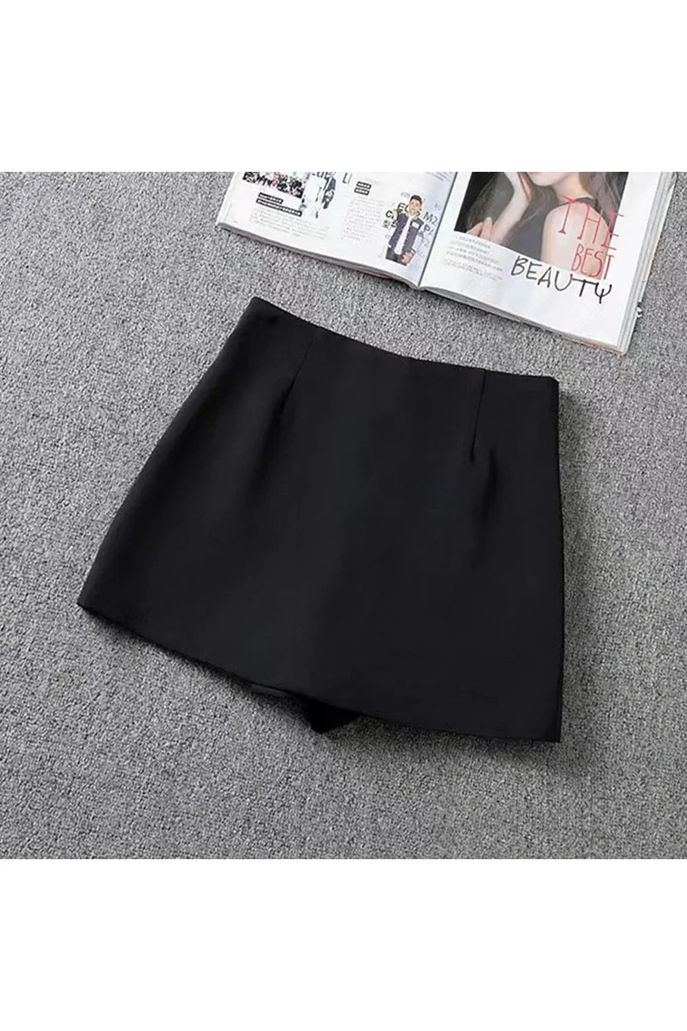 Stylish black split front mini skirt.