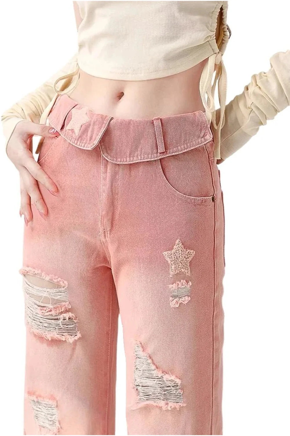 Pink distressed jeans with starry pattern.