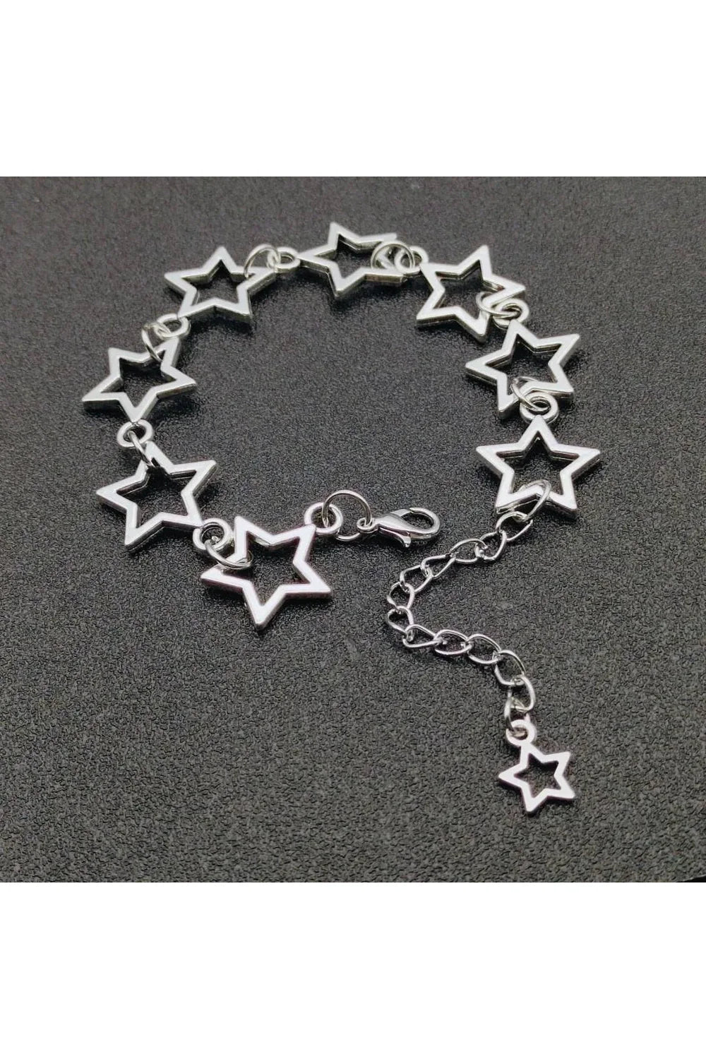 Chic Stellar Silhouette Charm Bracelet in Default Title.