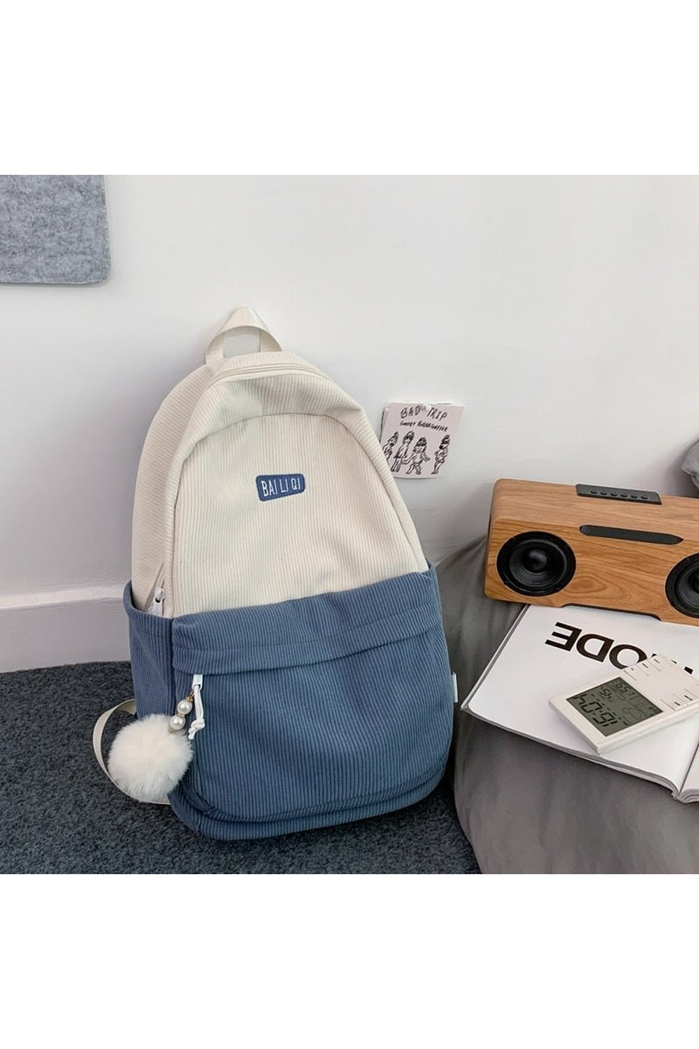 Sky Blue Striped Corduroy Student Backpack with vibrant hues.