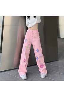 Pink Y2K jeans with fall-themed embroidery.