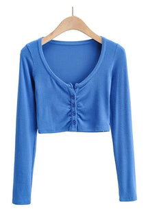 Blue V-neck long sleeve top, casual chic.