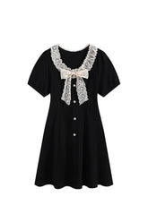 Elegant Victorian Lace Bow Dress in Black. Feminine.