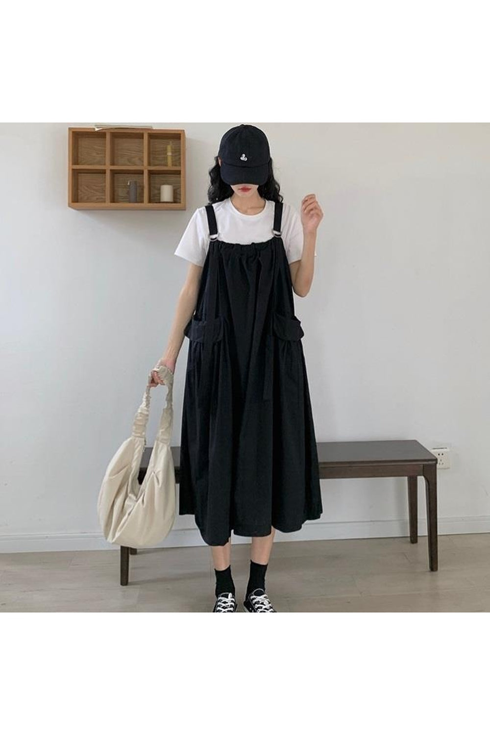 Vintage Sleeveless Long Dress in black, elegant design.