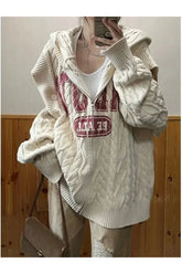 Cozy vintage zip-up sweater with slouchy style.