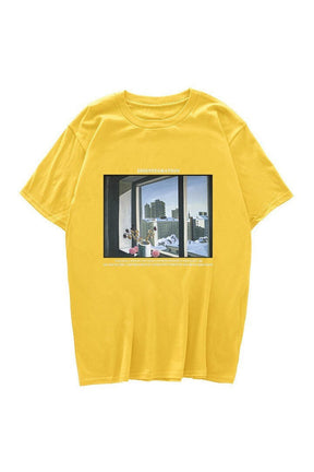 Retro yellow T-shirt showcases vintage window print.