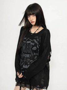 Trendy black Void Riot distressed sweater with style.