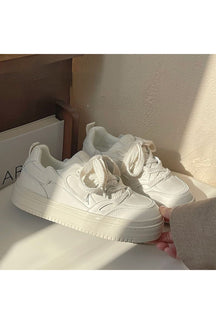 White Vintage Platform Sneakers with Mi detailing.