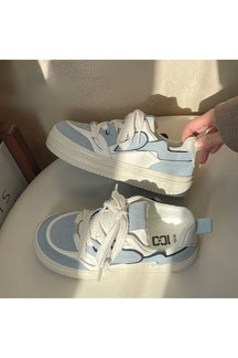 White Vintage Platform Sneakers in Lan, classic design.