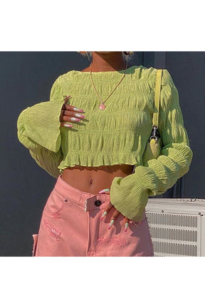 Vintage Y2K aesthetic green crop top style.