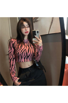 Zebra Long Sleeve Crop Top in One Size, trendy.